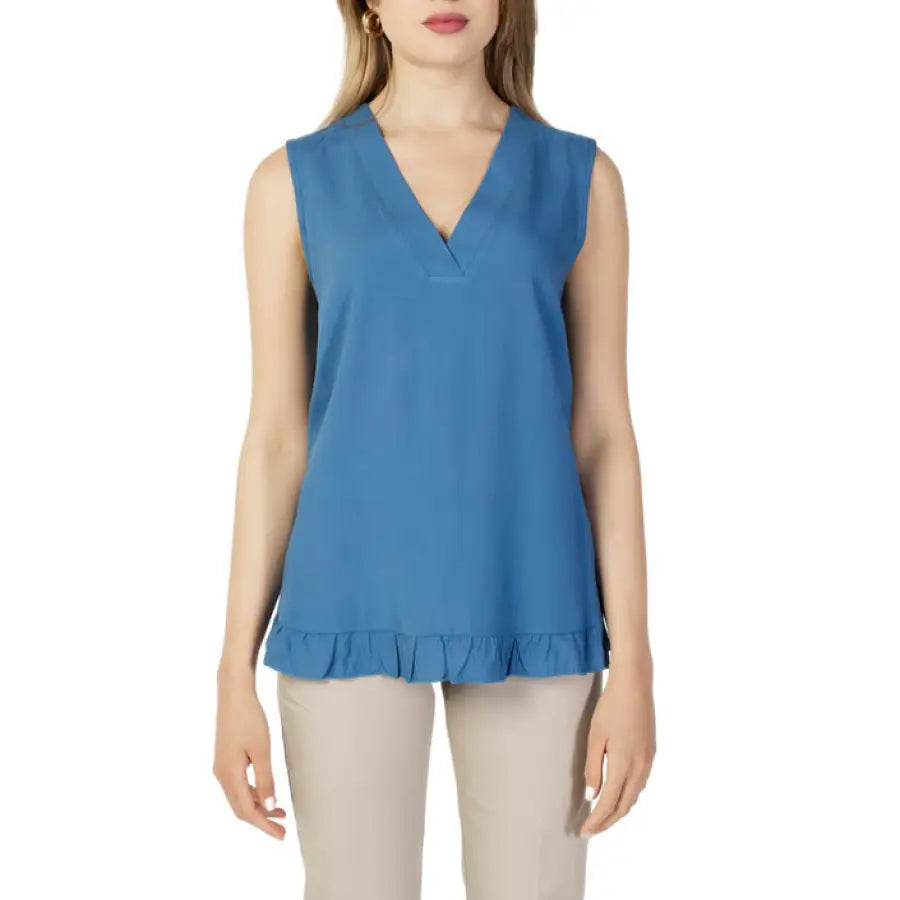 Woman in Sandro Ferrone blue V-neck undershirt, Sandro Ferrone fashion