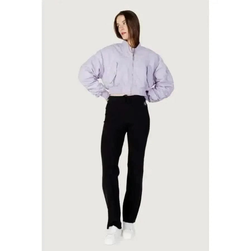 Woman in cropped lavender jacket and black pants from Calvin Klein Jeans Women Jacket