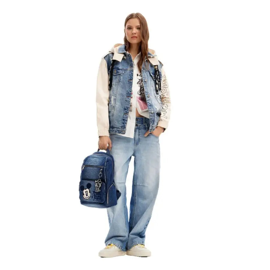
                      
                        Desigual women wearing denim vest and jeans from Desigual Women Blazer collection
                      
                    