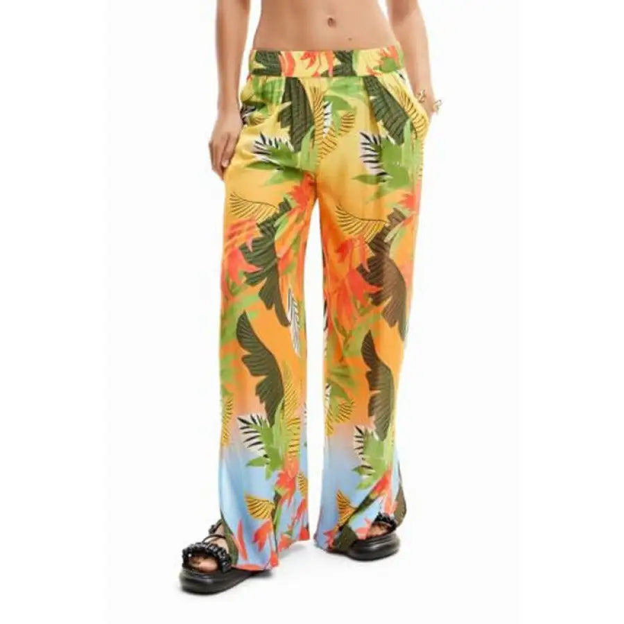 Woman in urban style colorful tropical print pants from Desigual Women Trousers collection