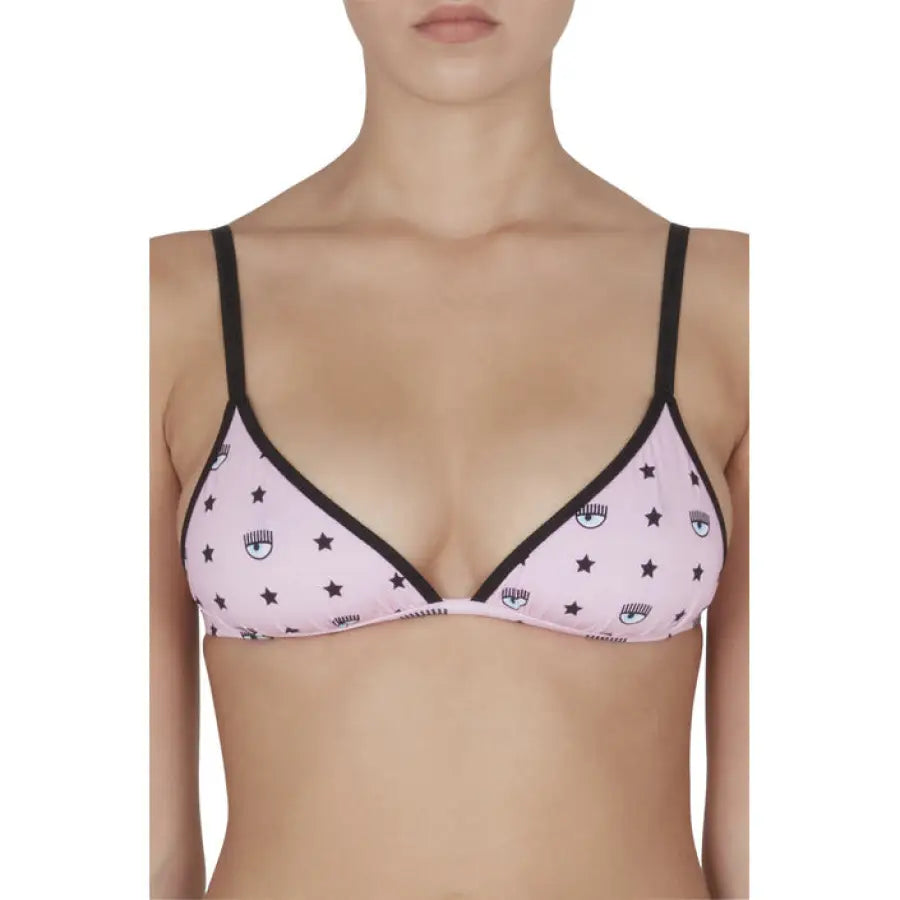 
                      
                        Chiara Ferragni wearing urban style pink bikini top with black stars for city fashion
                      
                    