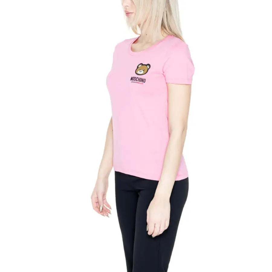 
                      
                        Woman in Moschino Underwear pink t-shirt featuring black cat for urban style fashion
                      
                    