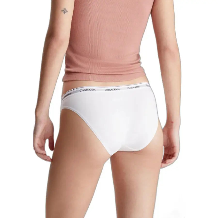 Woman in Calvin Klein underwear showcasing urban style clothing