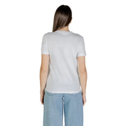 Woman modeling Calvin Klein Jeans white short sleeve round neck T shirt with light blue wide-leg pants