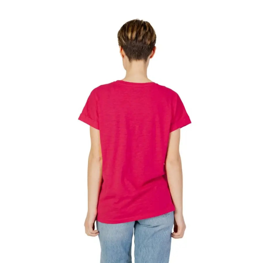 Woman in red shirt and jeans showcasing urban style clothing for Blauer Women T-Shirt