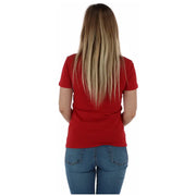 Woman wearing Guess Women Red Round Neck Cotton T Shirt with blue jeans
