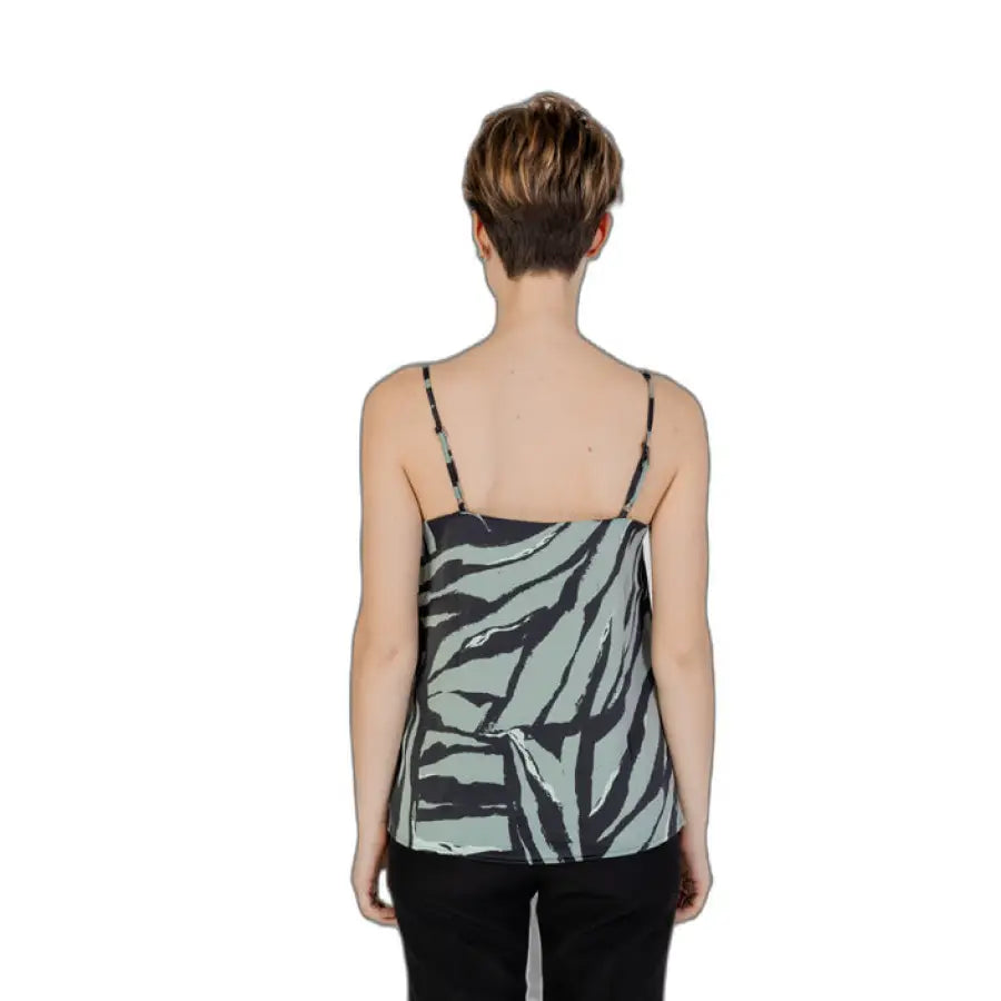 Woman wearing Only Women Undershirt in zebra print, urban style clothing
