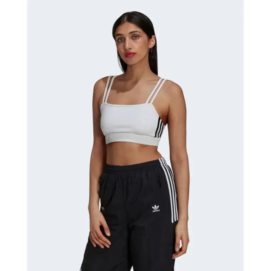 Adidas women model in Adidas white top and black pants for Adidas - Adidas Women Top