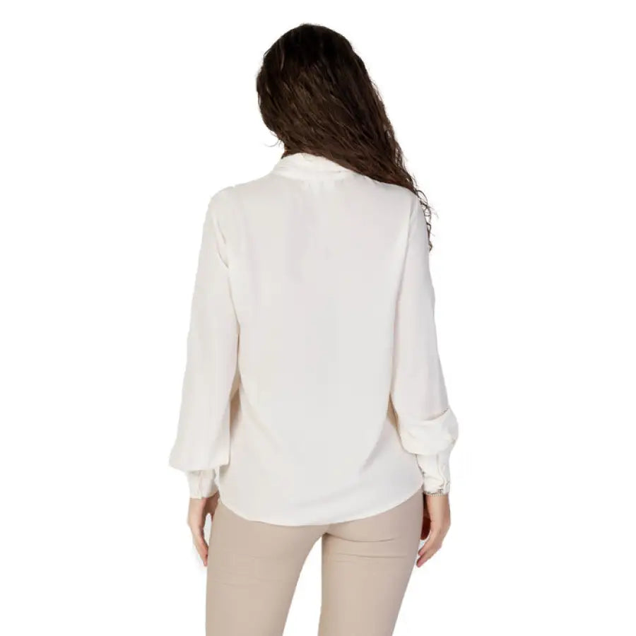 Sandro Ferrone woman in white blouse and beige pants for Sandro Ferrone Women Blouse