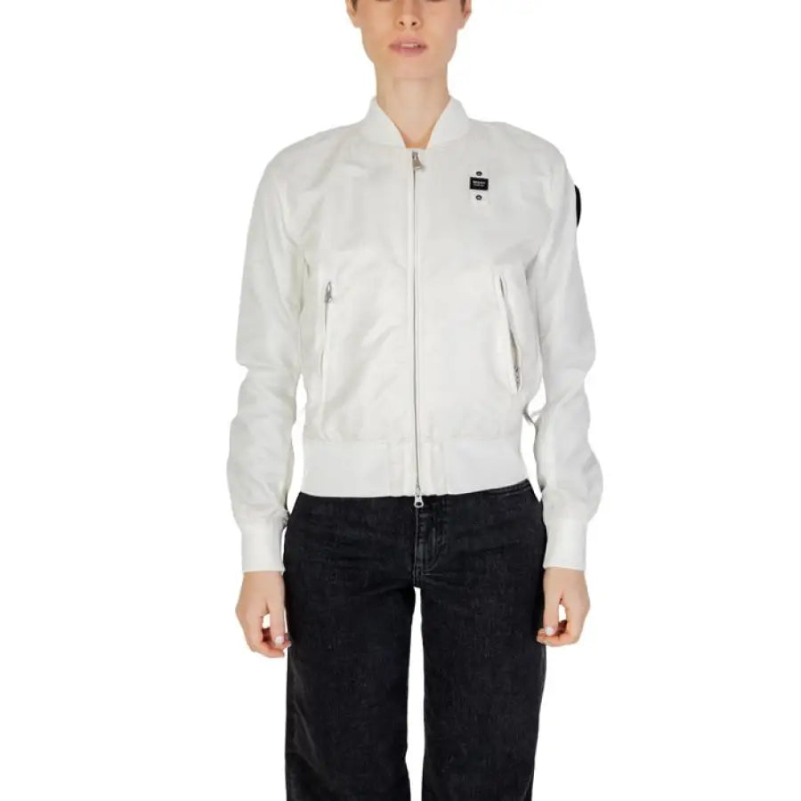 Woman modeling Blauer women jacket for spring summer collection, white leather attire.