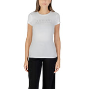 Woman wearing Armani Exchange white rhinestone print short sleeve T shirt with black pants