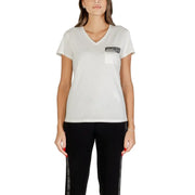 Woman wearing Liu Jo White V Neck Cotton T Shirt with Pocket and black leggings with side stripes