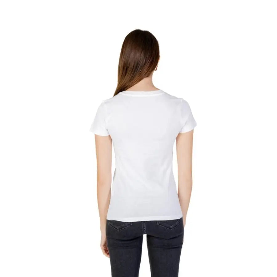 Woman wearing Calvin Klein Jeans Women T-Shirt in white