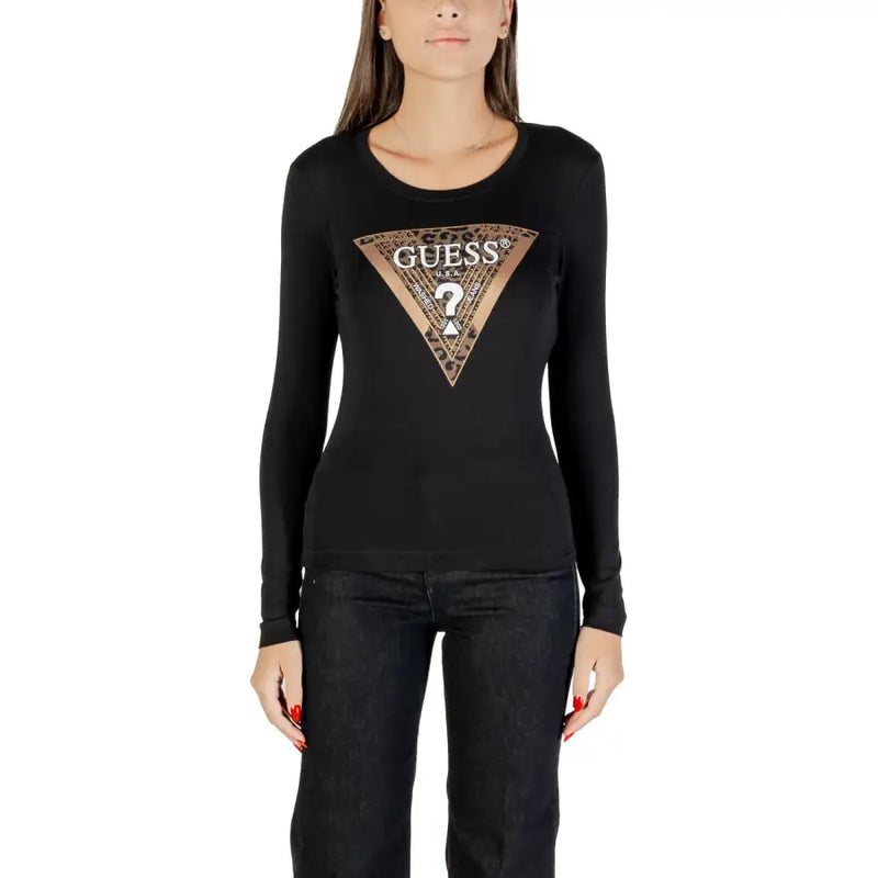 Woman wearing Guess long-sleeve black round neck T-shirt with gold and black patterned logo