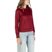 Woman wearing Calvin Klein Women Bordeaux hooded sweatshirt with front pocket