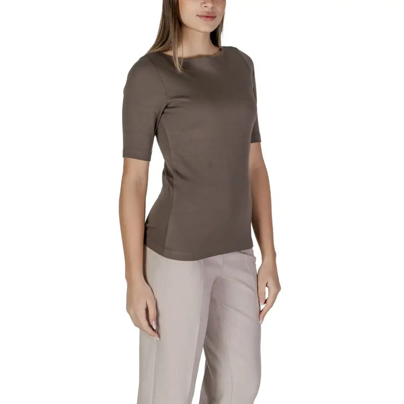 Street One Women Brown Round Neck Slip On T Shirt paired with light beige pants