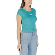 Teal Calvin Klein Jeans women’s short sleeve round neck crop top with chest patch