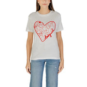 Woman wearing Desigual white short-sleeve T-shirt with red heart design and round neck