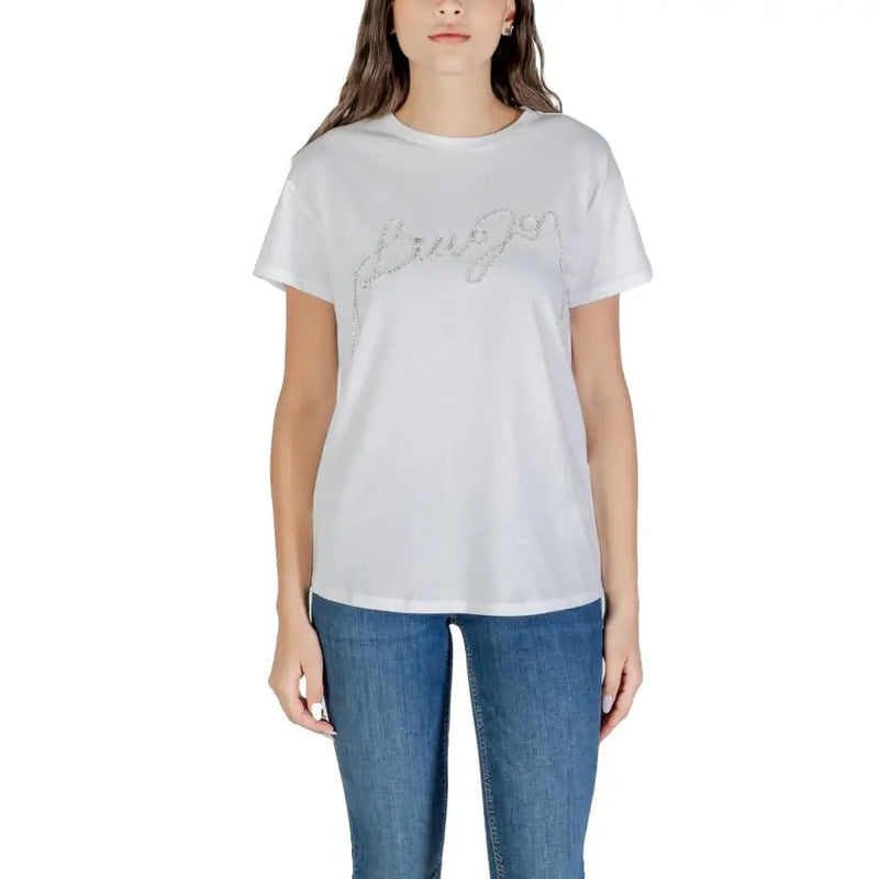 White Liu Jo women’s short sleeve round neck cotton T-shirt with sparkly logo and blue jeans