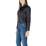 Women black moto jacket in black matte finish with zipped pockets and subtle brand patch on the shoulder
