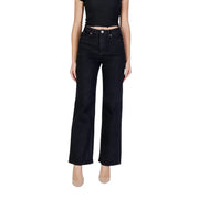 Women dark wash high waist wide leg denim jeans in black denim with a straight-leg cut shown from the back side