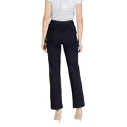 Women’s black dress pants from Guess Fall Winter collection featuring zip and button details