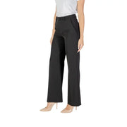 Rinascimento Black Women Fall Winter Trousers featuring wide-leg design and nude high heels