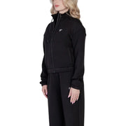 Women’s black zip-up hooded sweatshirt with matching sweatpants for active wear