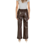 Women’s brown faux leather wide-leg trousers with elastic waist and cuffed hems for Fall Winter style