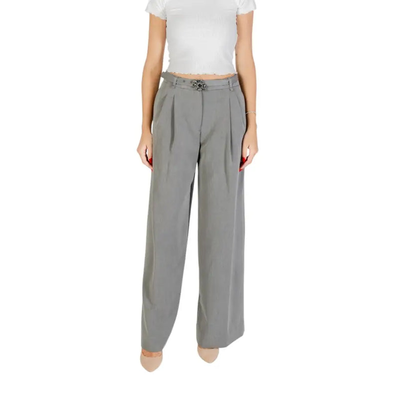 Women’s high-waisted wide-leg gray trousers with pleats and decorative belt buckle