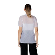 Women’s sheer white mesh top with solid white band across chest and subtle pattern on lower half