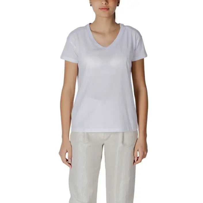 Woman wearing a white V-neck T shirt featured in Womens White V Neck T Shirt product image